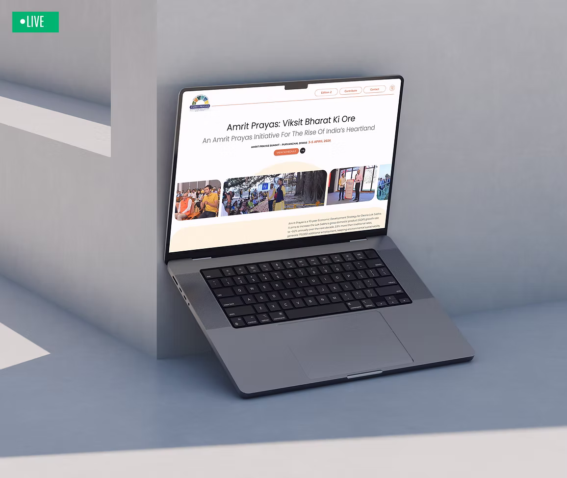 Amrit Prayas website on a laptop